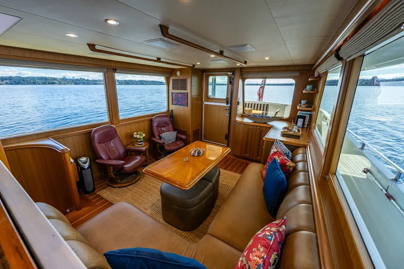 Slide: The Image of Luxurious interior of 2011 Ocean Alexander 60 Trawler with panoramic windows and elegant seating. - 77