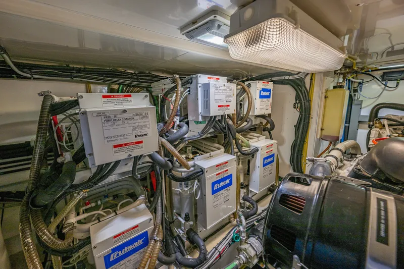 Slide: The Image of Engine room of 2011 Ocean Alexander 60 Trawler with electrical systems and machinery. - 121