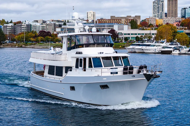 Slide: The Image of Ocean Alexander 60 Trawler 2011 cruising in urban waterfront setting. - 25