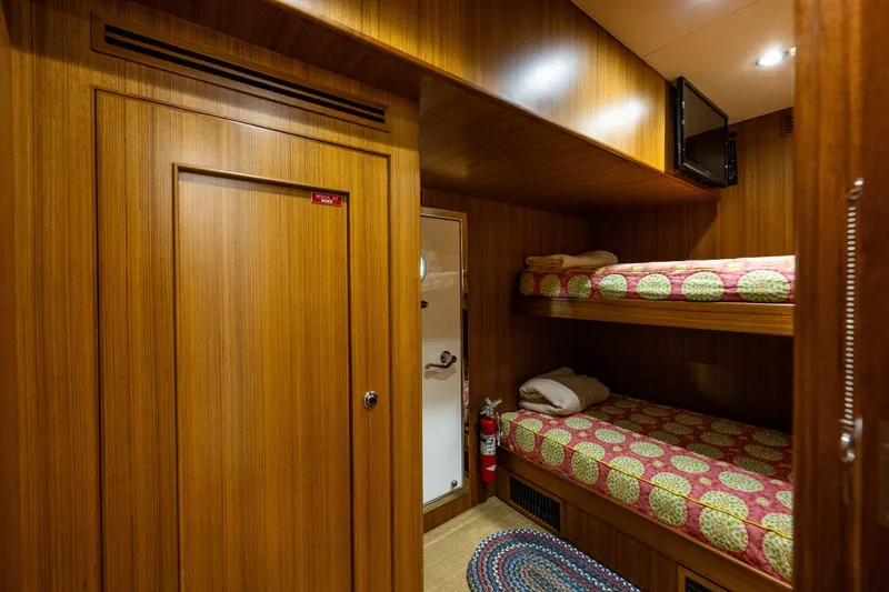Slide: The Image of Cozy cabin with bunk beds in 2011 Ocean Alexander 60 Trawler yacht. - 104
