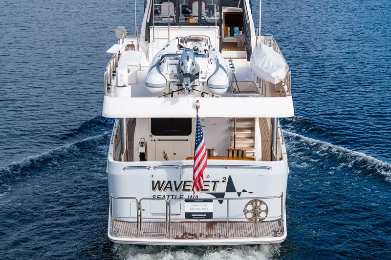 Slide: The Image of Ocean Alexander 60 Trawler 2011 cruising, rear view with American flag, named "WAVELET," Seattle, WA. - 13