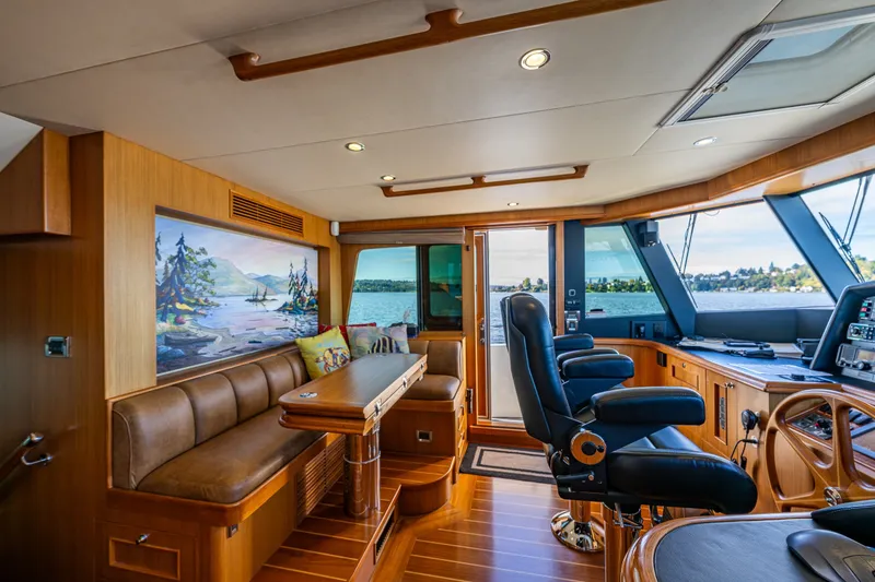 Slide: The Image of Luxurious interior of 2011 Ocean Alexander 60 Trawler with leather seating and scenic artwork. - 64