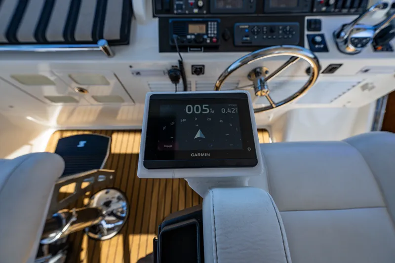 Slide: The Image of Cockpit of 2011 Ocean Alexander 60 Trawler with Garmin navigation display. - 59
