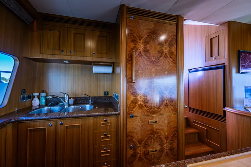 Slide: The Image of Luxurious wooden kitchen interior of 2011 Ocean Alexander 60 Trawler yacht. - 79