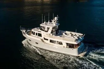 Slide: The Image of Ocean Alexander 60 Trawler 2011 cruising on calm waters, aerial view. - 7