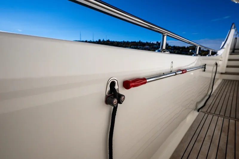 Slide: The Image of Ocean Alexander 60 Trawler 2011 yacht deck with railing and mooring line. - 39