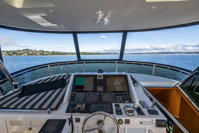 Slide: The Image of Helm of 2011 Ocean Alexander 60 Trawler with panoramic sea view. - 57