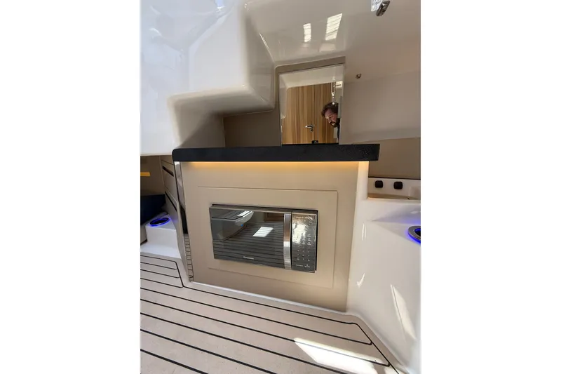 Slide: The Image of Interior of 2027 Granfort 370 GTX yacht with modern design and built-in appliances. - 60