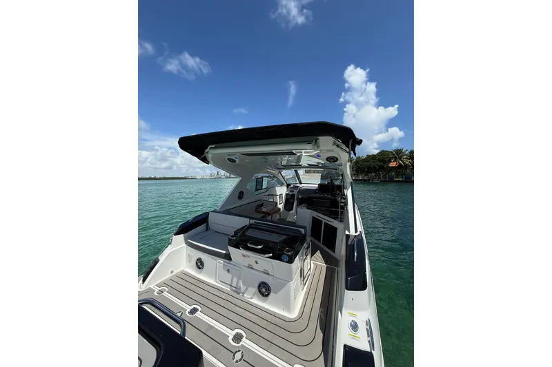 Slide: The Image of Granfort 370 GTX 2027 luxury boat interior with sleek design on a sunny day. - 16