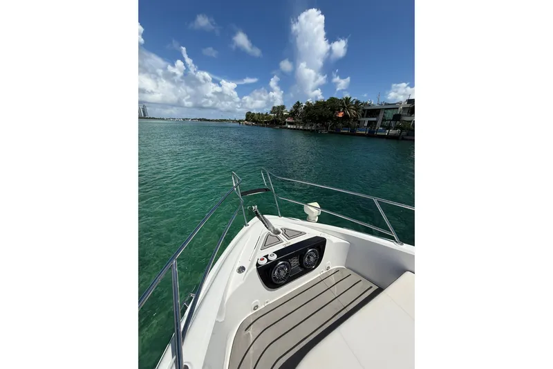 Slide: The Image of Granfort 370 GTX 2027 yacht cruising on clear blue waters under a sunny sky. - 47