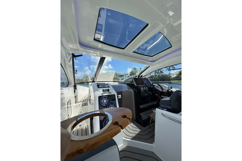 Slide: The Image of Interior view of 2027 Granfort 370 GTX yacht with modern dashboard and skylights. - 33