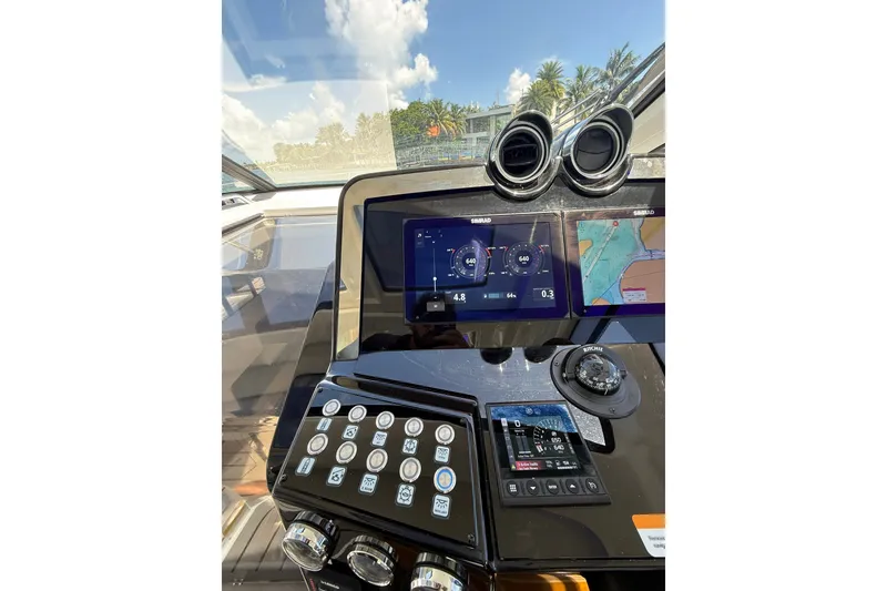 Slide: The Image of Granfort 370 GTX 2027 yacht dashboard with navigation screens and control panel. - 28