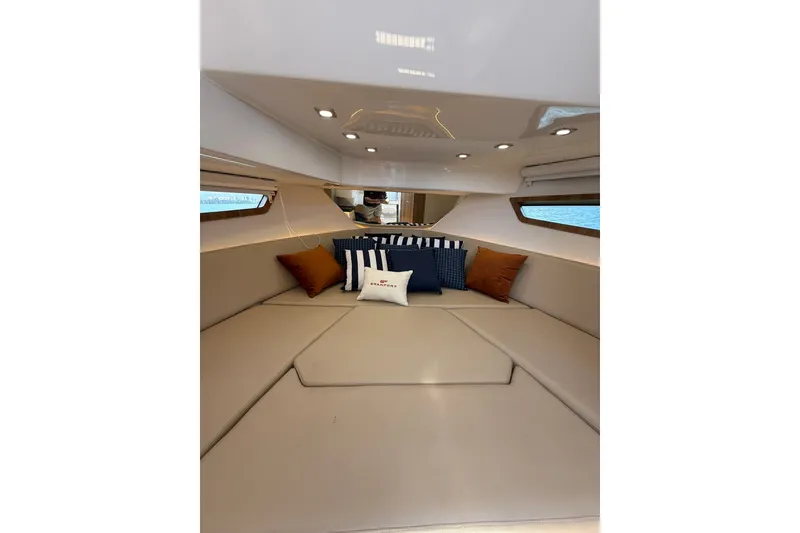 Slide: The Image of Luxurious interior of 2027 Granfort 370 GTX yacht with plush seating and cushions. - 58