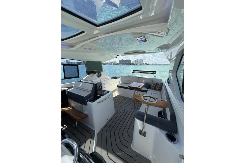 Slide: The Image of Luxurious interior of 2027 Granfort 370 GTX yacht with panoramic views and modern design. - 31