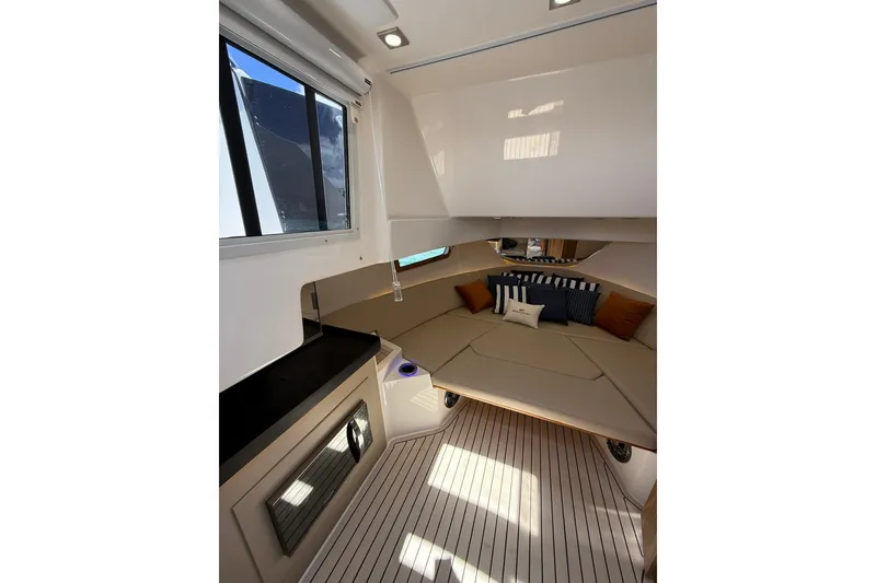 Slide: The Image of Luxurious interior of 2027 Granfort 370 GTX yacht with cozy seating and modern design. - 55