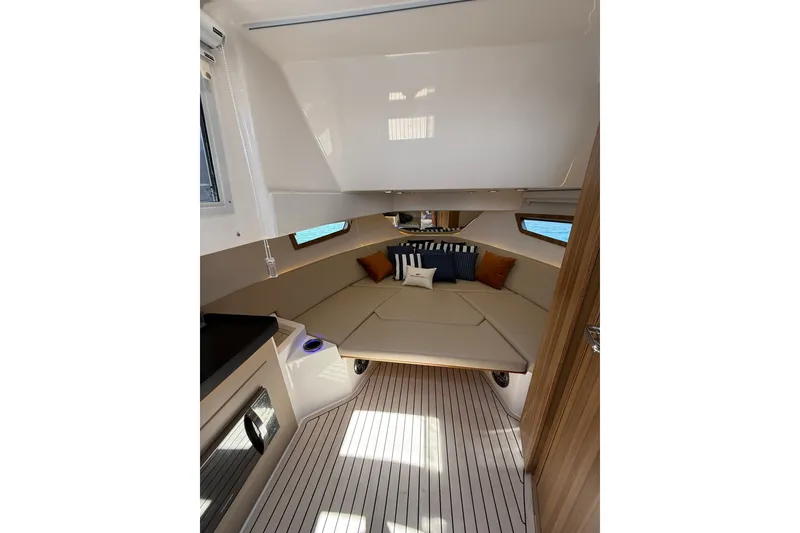 Slide: The Image of Luxurious interior of 2027 Granfort 370 GTX yacht with cozy seating and modern design. - 56