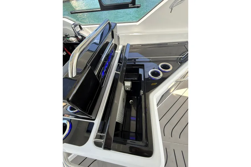 Slide: The Image of Granfort 370 GTX 2027 yacht interior with sleek black and chrome design elements. - 40