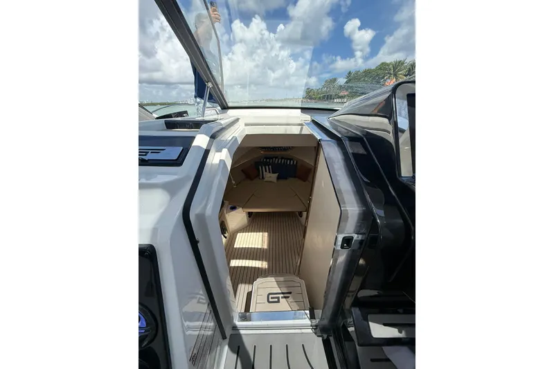 Slide: The Image of 2027 Granfort 370 GTX cabin entrance with sleek design and modern interior. - 52