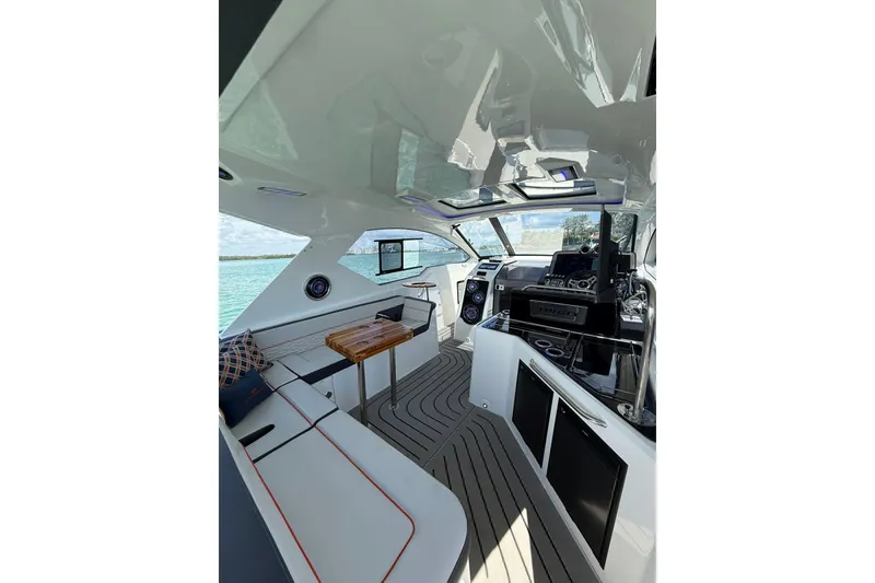 Slide: The Image of Luxurious interior of 2027 Granfort 370 GTX yacht with modern design and scenic ocean view. - 21