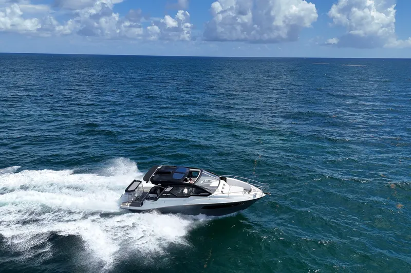 Slide: The Image of Granfort 370 GTX 2027 cruising on open ocean under clear blue sky. - 2