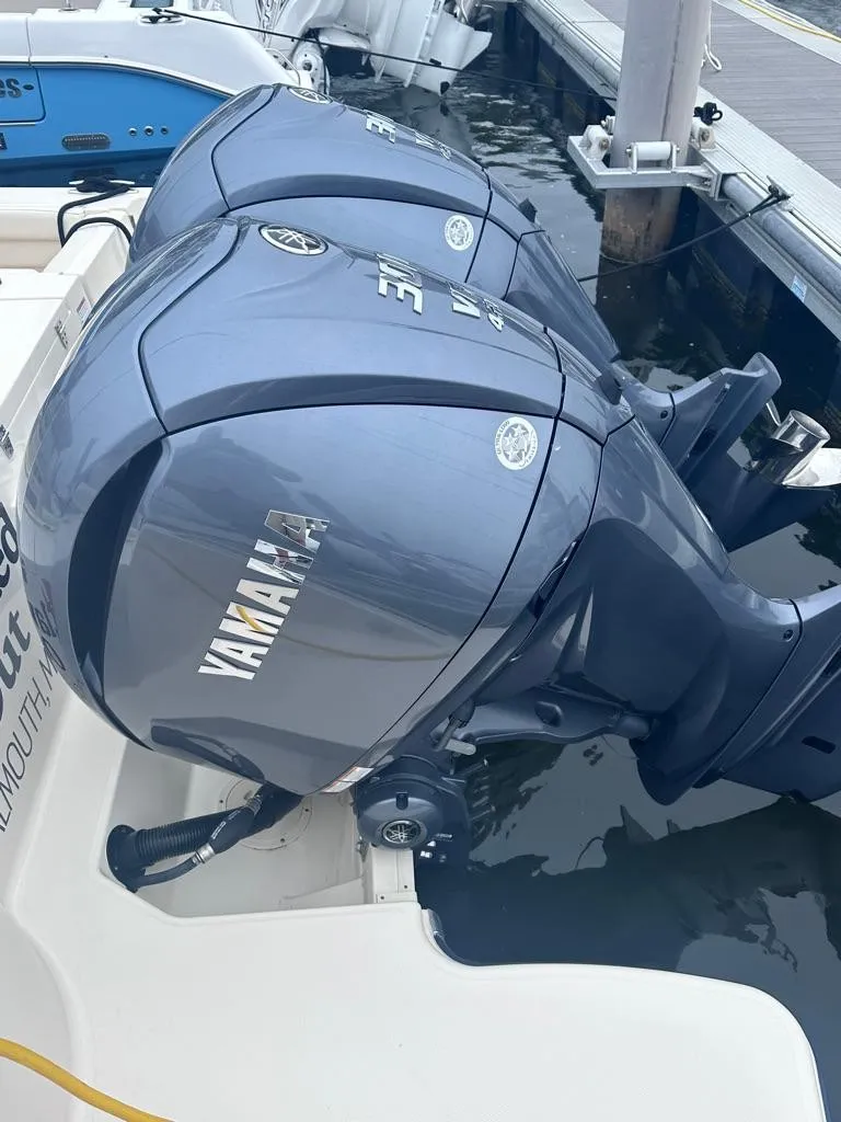 Slide: The Image of 2022 Grady-White Canyon 326 with twin Yamaha outboard engines. - 31