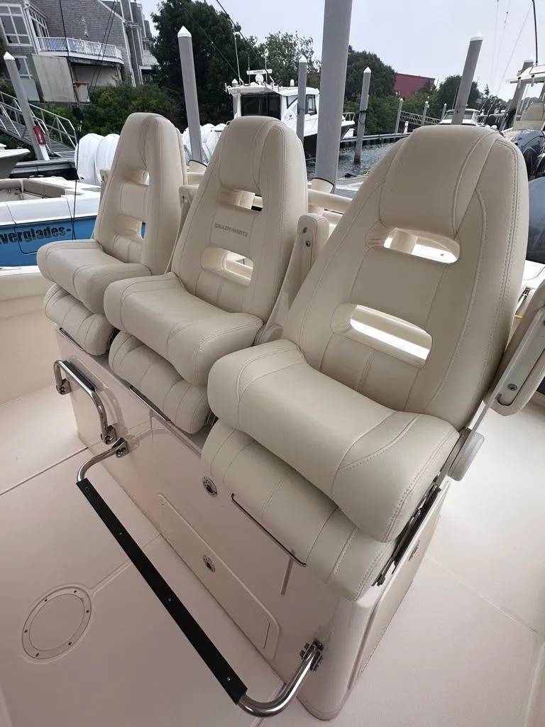 Slide: The Image of 2022 Grady-White Canyon 326 boat with luxurious seating. - 20
