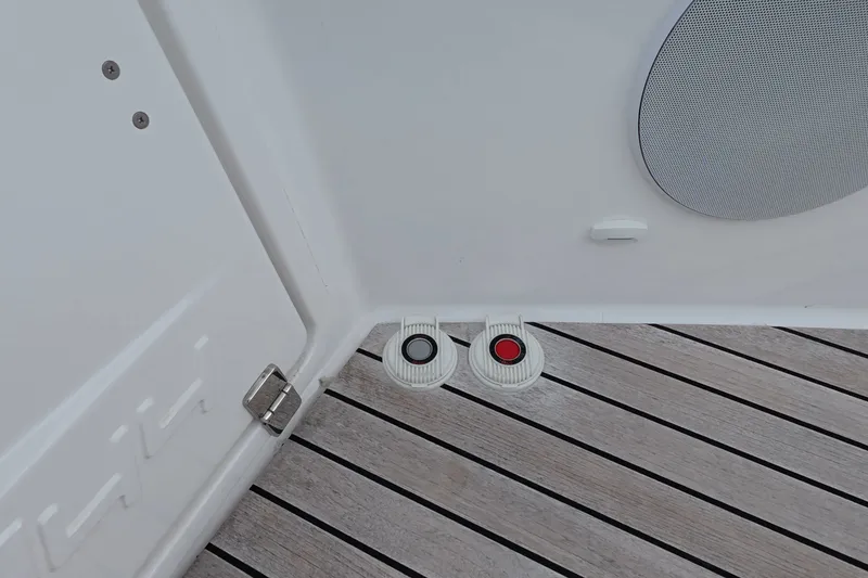 Slide: The Image of Deck of 2025 Schaefer V44 yacht with control buttons and speaker. - 26