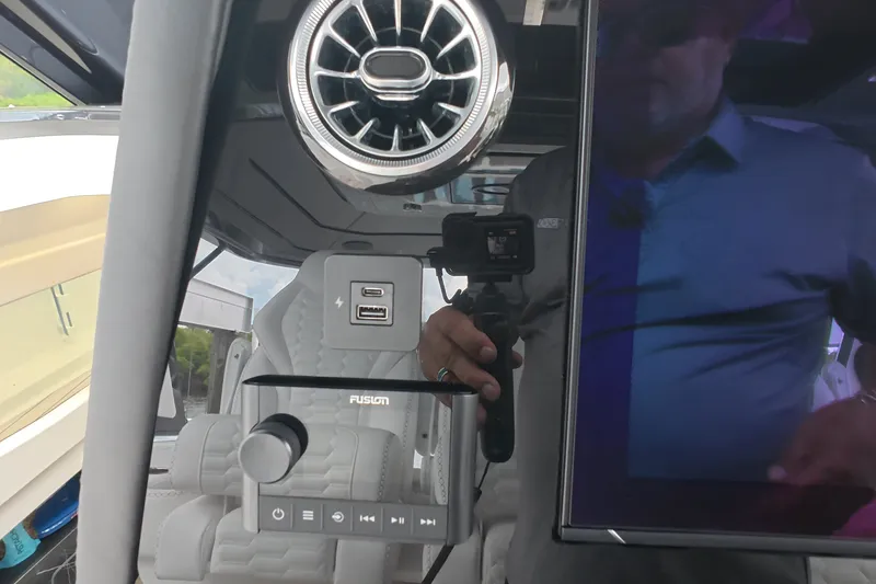Slide: The Image of Interior of 2025 Schaefer V44 yacht with modern controls and USB ports. - 40