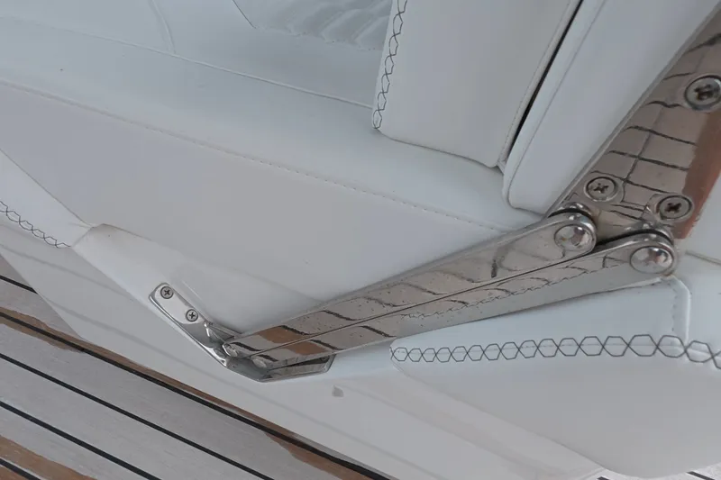 Slide: The Image of Close-up of Schaefer V44 2025 boat seat with metal hinge detail. - 58