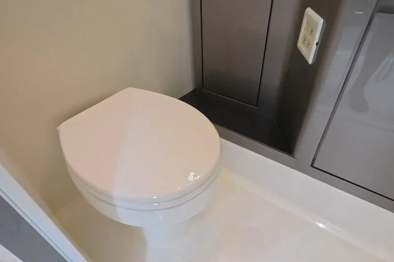 Slide: The Image of Modern bathroom in 2025 Schaefer V44 yacht, featuring sleek toilet design. - 21