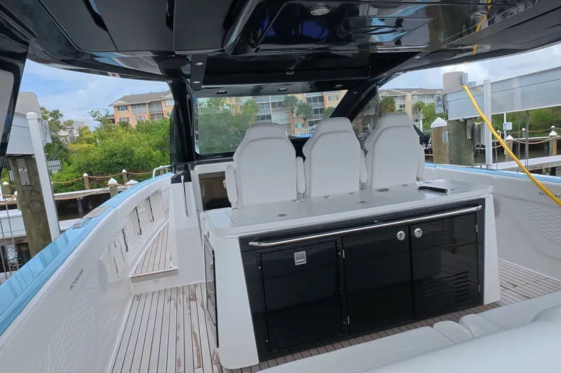 Slide: The Image of Luxury Schaefer V44 yacht interior with sleek seating and modern amenities, 2025 model. - 36