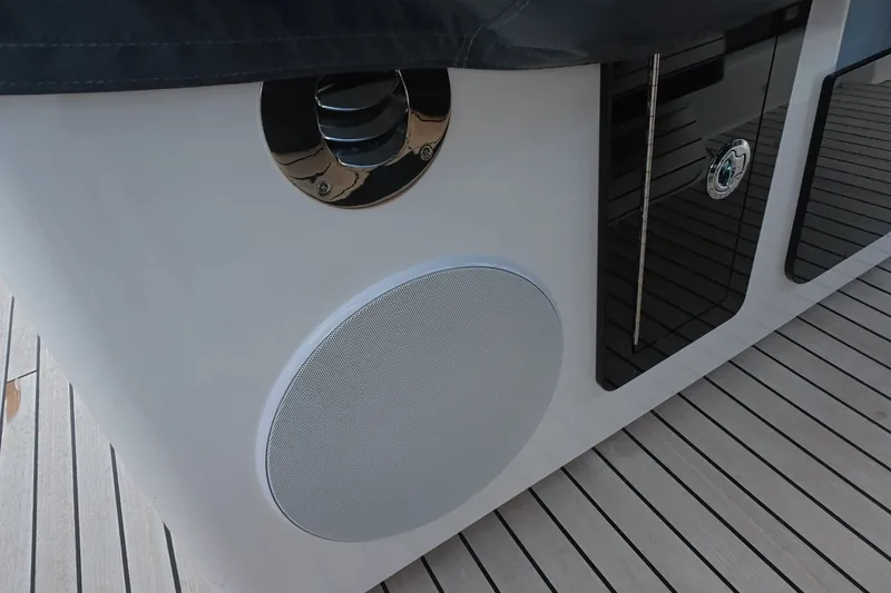 Slide: The Image of Schaefer V44 yacht detail, featuring speaker and sleek design elements, 2025 model. - 53