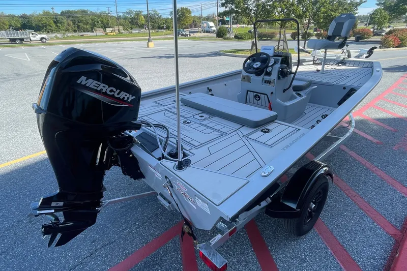 The Image of 2027 Tracker Bass Tracker 175 CC boat with Mercury engine, parked outdoors. - 0