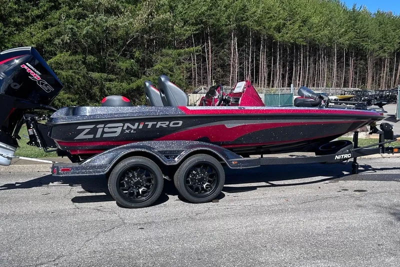 Slide: The Image of 2027 Nitro Z19 XL Pro boat with sleek design on a trailer, parked outdoors. - 5