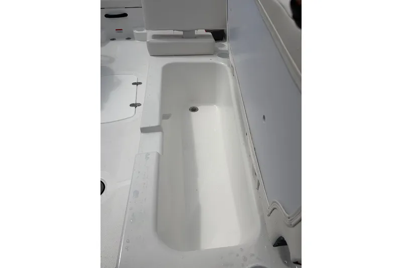 Slide: The Image of Interior view of 2027 Tahoe T18 boat storage compartment, showcasing spacious design and functionality. - 11
