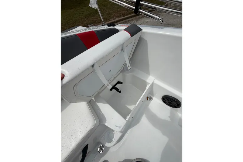 Slide: The Image of Interior view of 2027 Tahoe T18 boat, featuring storage compartment and speaker. - 15