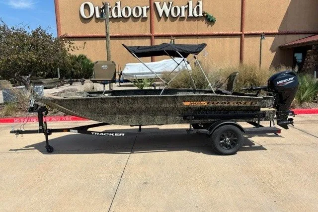 The Image of 2027 Tracker Grizzly 1756 T Marsh boat parked outside Outdoor World. - 0