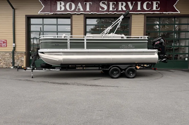 The Image of 2027 Sun Tracker Fishin' Barge 20 DLX pontoon boat at boat service center. - 0