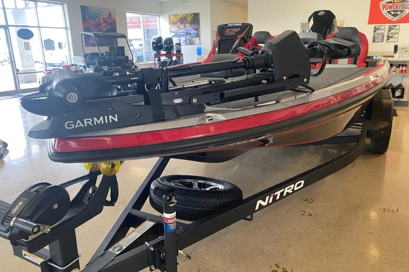 Slide: The Image of 2027 Nitro Z19 XL Pro boat with Garmin equipment displayed in showroom. - 3