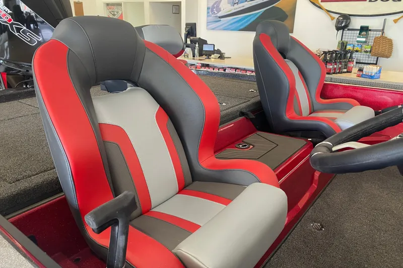 Slide: The Image of 2027 Nitro Z19 XL Pro boat interior with red and gray seats, steering wheel visible. - 4