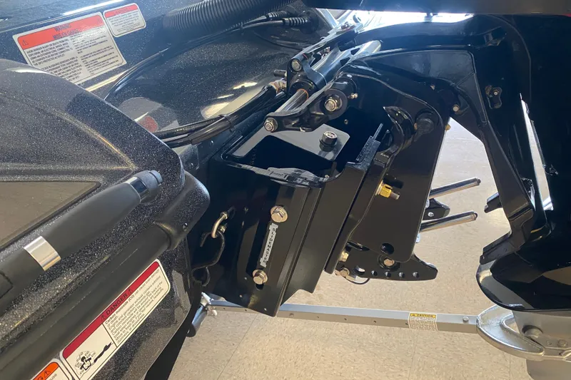 Slide: The Image of 2027 Nitro Z19 XL Pro boat engine mount with detailed components and warning labels. - 7