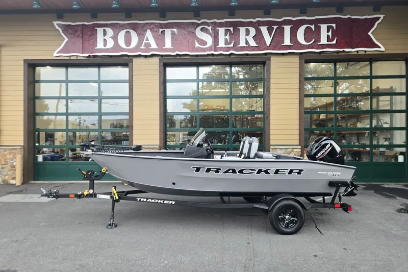 The Image of 2027 Tracker Pro Guide V-16 SC boat on trailer at service center. - 0