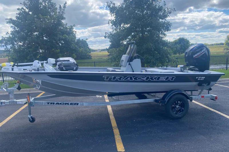 The Image of 2027 Tracker Bass Tracker 175 CC boat on trailer, parked outdoors. - 0