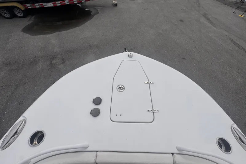 Slide: The Image of Bow view of 2024 Sea Hunt Escape 25 boat on a trailer. - 52