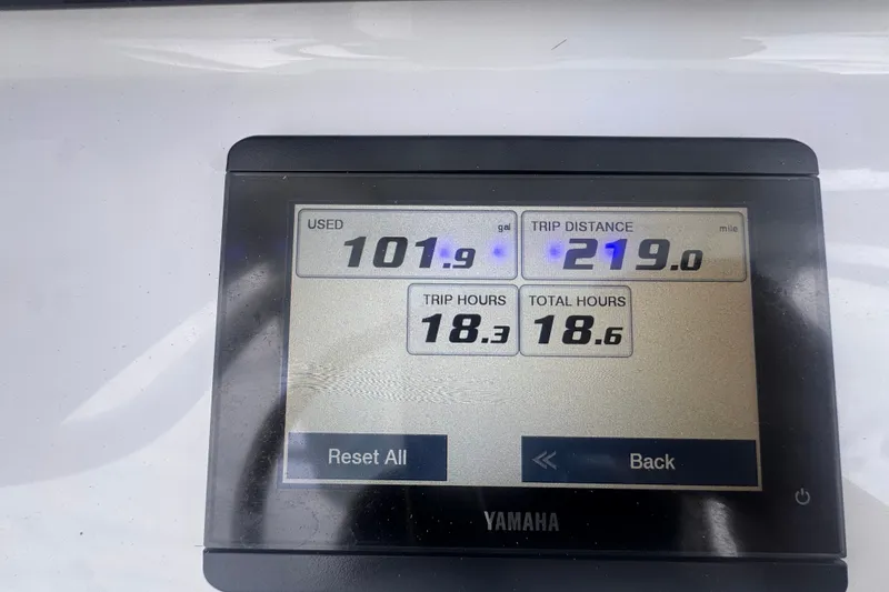 Slide: The Image of Yamaha display showing fuel usage and trip data for 2024 Sea Hunt Escape 25. - 28