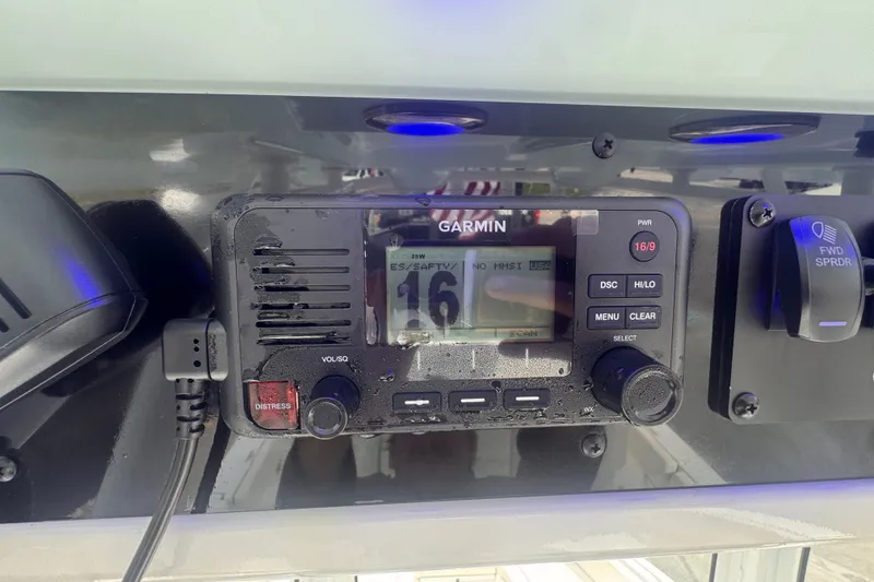 Slide: The Image of Garmin marine radio on 2024 Sea Hunt Escape 25 boat dashboard. - 37