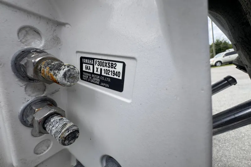 Slide: The Image of Close-up of Yamaha F300XSB2 engine label on 2024 Sea Hunt Escape 25 boat. - 73