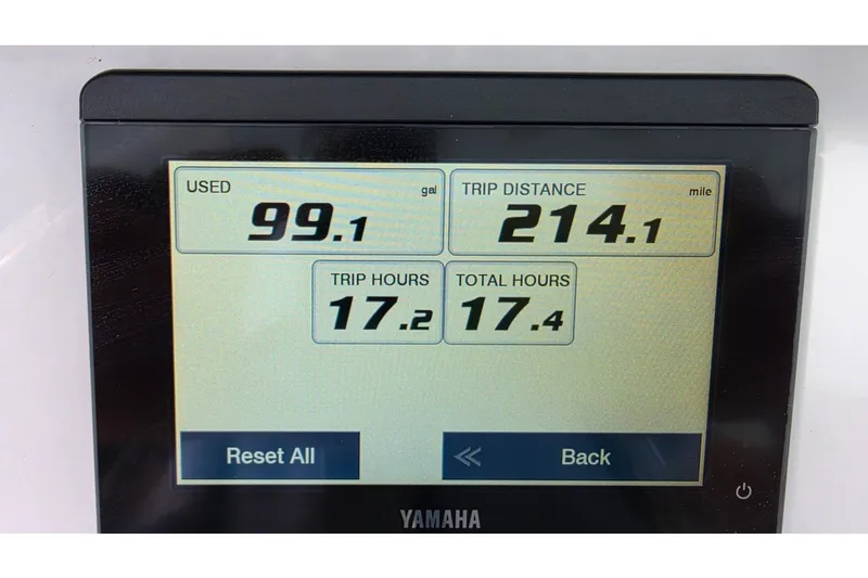 Slide: The Image of A Yamaha display shows 99.1 gallons used and 214.1 miles trip distance. - 8