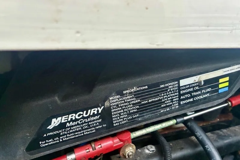 Slide: The Image of Mercury MerCruiser engine specifications label on a 2002 Pursuit 3000 Express boat. - 37