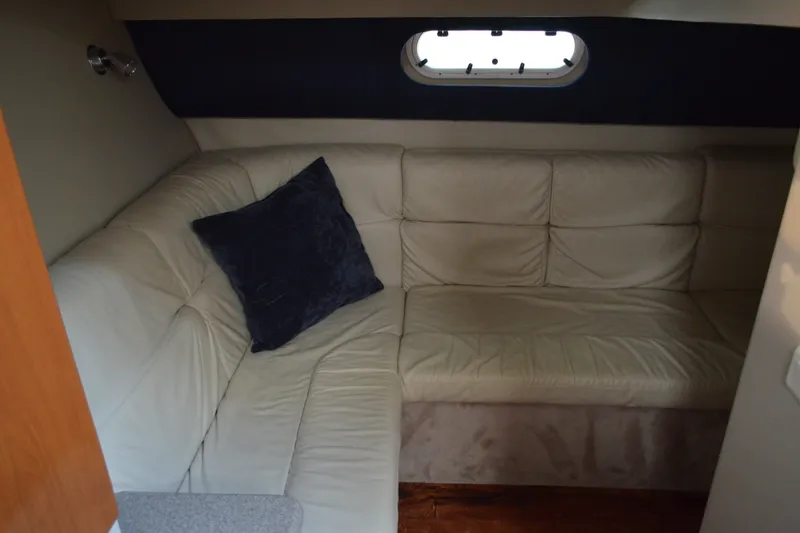 Slide: The Image of Cozy interior of 2002 Formula 37 Performance Cruiser with beige leather seating. - 57